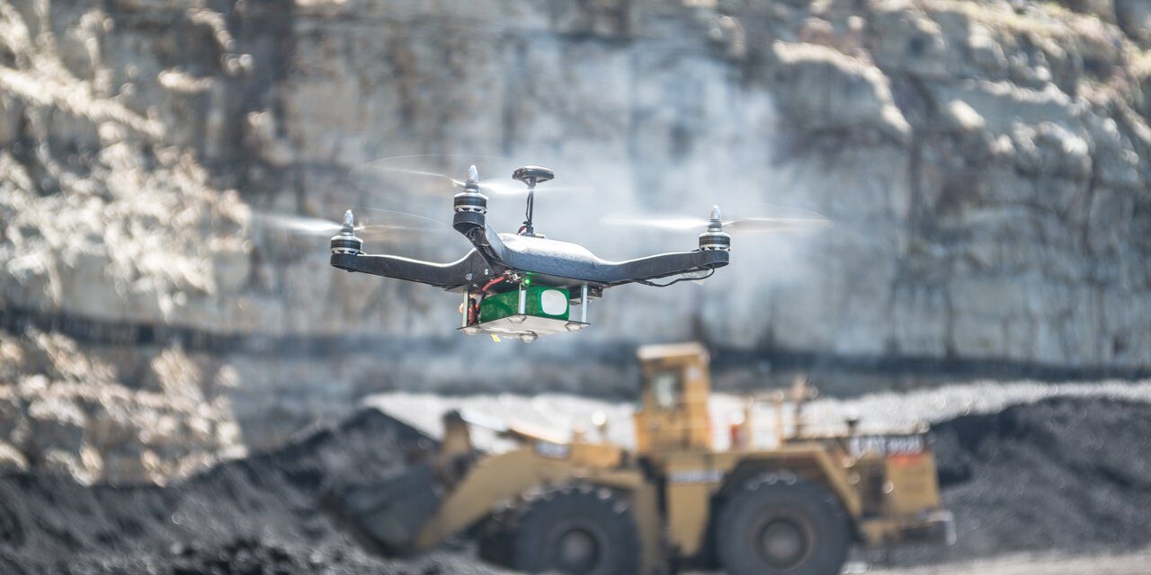 Drone system assisting miners to free space across sites 1